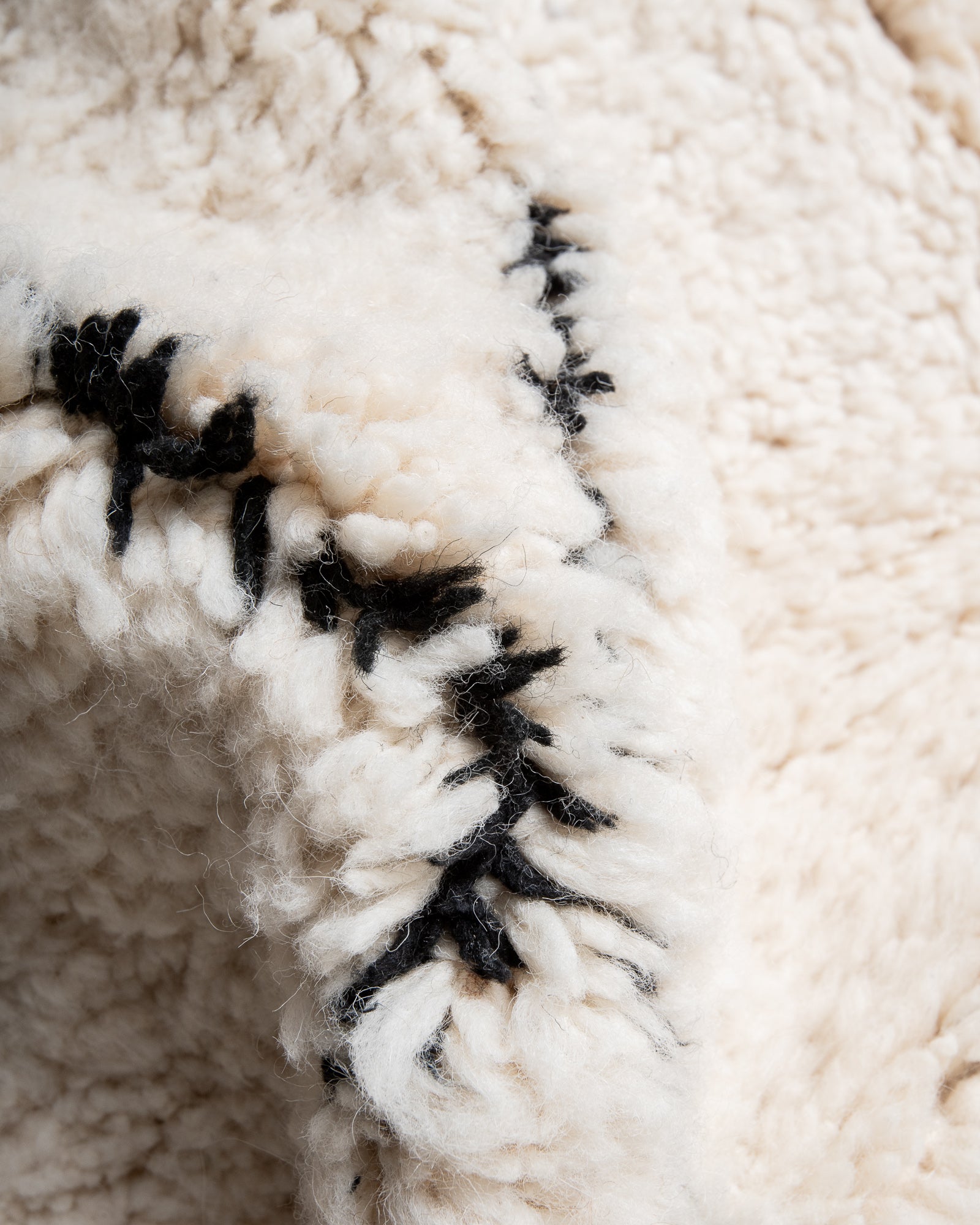 Modern, designer, handcrafted Berber rug from Morocco. Beniourain carpet with beautiful colours and patterns and fluffy wool texture.